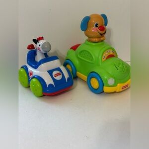Fisher-Price Set of Cars includes  Lights and Sounds Police Car & Puppy